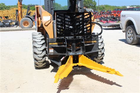 tree puller attachment skid steer rental|danuser intimidator tree puller.